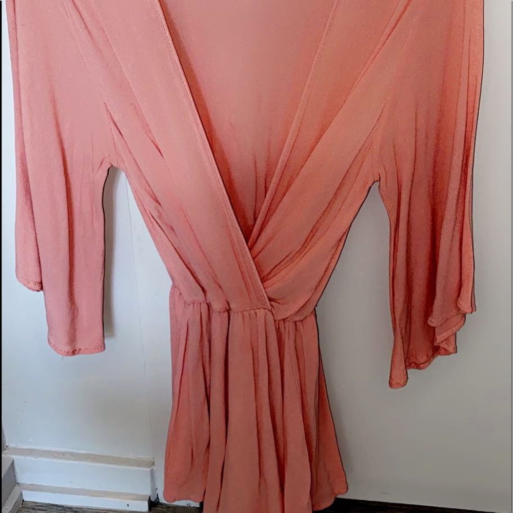 Pink body cross romper